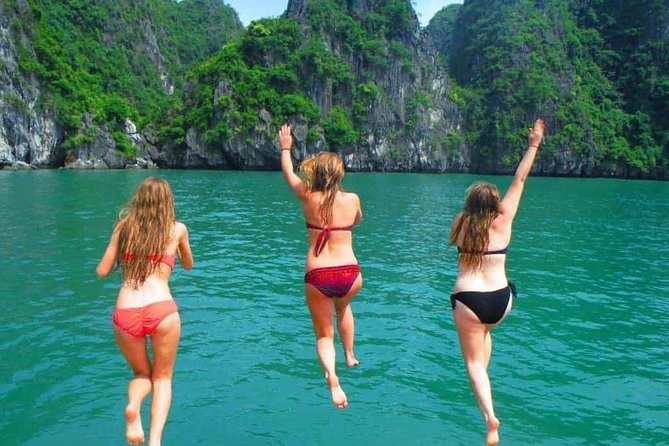 1 Day Boat Tour: HaLong Bay, Lan Ha Bay, Natural Beach and Full Moon Party - Stop 1 in Lan Ha Bay: Fishermen’s Village Views and Sun-Soak Time