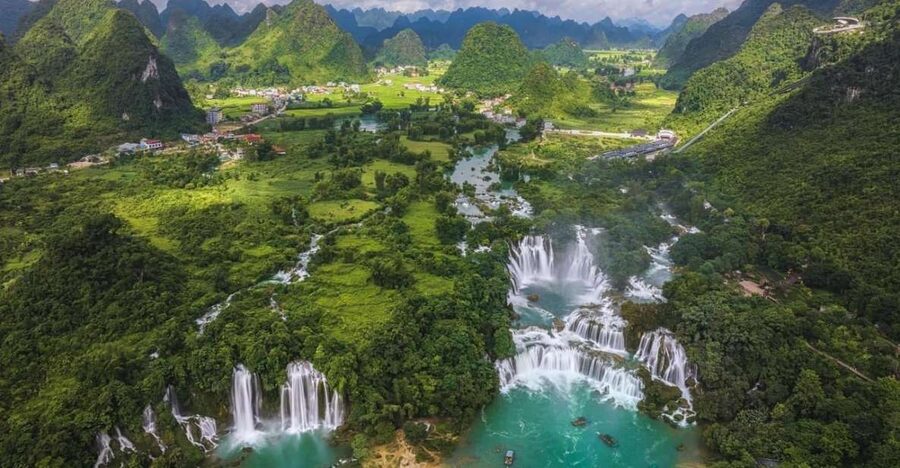 2Day Ban Gioc Waterfall Tour from Hanoi - Sugarcane farms, border views, and village breaks along the way
