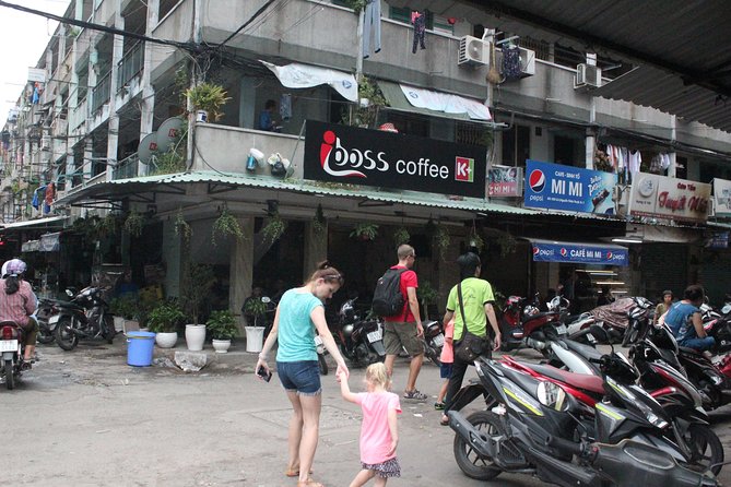 Afternoon Saigon Unseen Adventure by Scooter |Opt: Ao Dai Riders - Ho Thi Ky Flower Market and grilled oysters for your senses