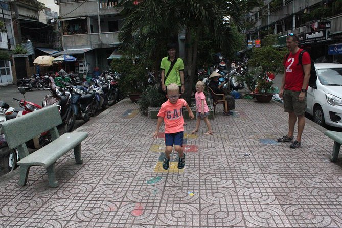 Afternoon Saigon Unseen Adventure by Scooter |Opt: Ao Dai Riders - Thich Quang Duc monument and the August Revolution story that sticks