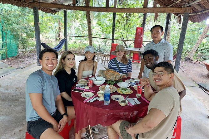 Authentic 'Less-Touristy' Mekong Delta Ben Tre 1-Day Tour - Biking through Ben Tre: countryside views with real movement