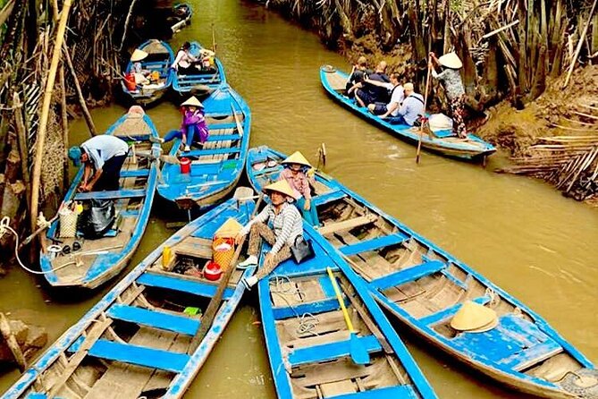 Authentic Mekong Delta: Tuk Tuk, Rowing Boat, Biking Tour - Canal rowing on the Mekong Delta: what the boat portion feels like