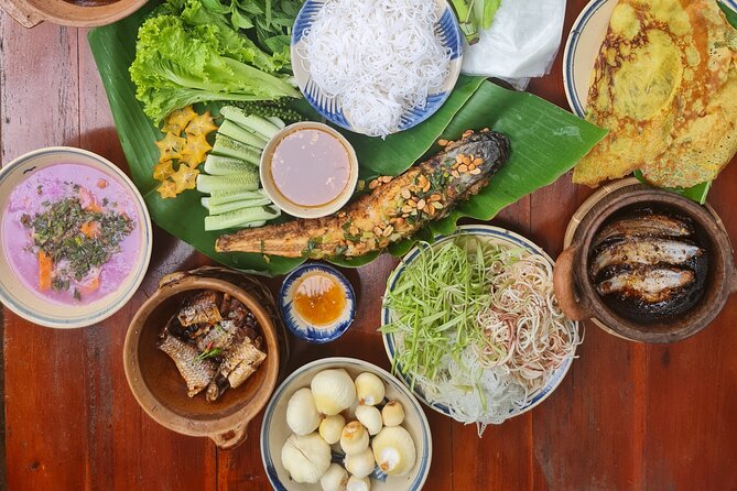 Ben Tre Mekong Zig Zag: Scooter, Sailboat, and Food (Full day) - Ben Tre City and Street Food: narrow roads and local flavors