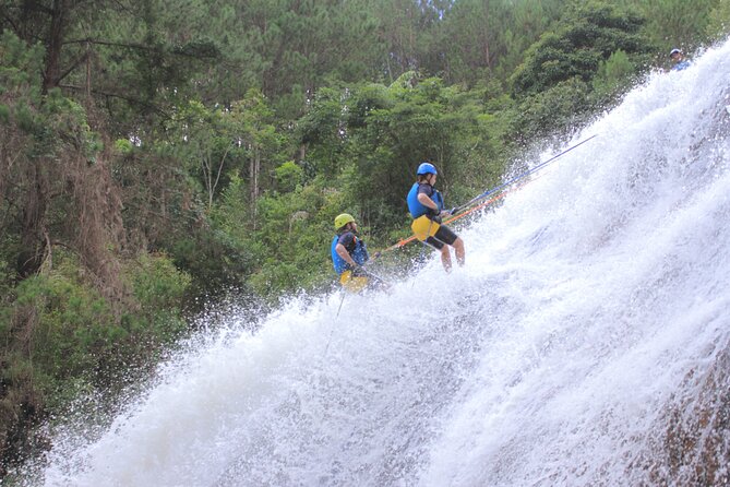 Canyoning Tour in Dalat Viet Nam - Tyrolean traverse plus natural water sliding