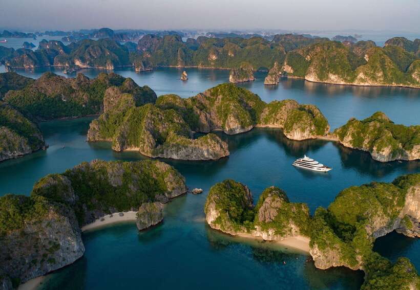 Cat Ba: Full- day trip with biking, kayaking, meal, tickets - Kayaking Caves, Swimming at Ba Trai Dao, and Boat Deck Moments