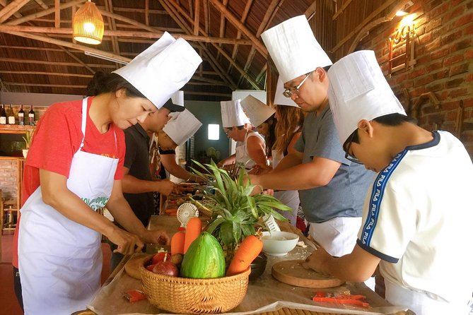 Cooking Class Hoi An:Local Market, Basket Boat, Fishing & Cooking - Net fishing and purple crabs: hands-on canal fun