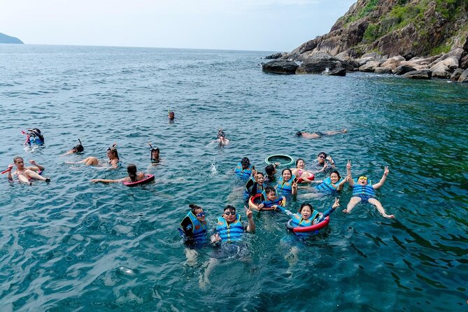Coral Reef Snorkeling and Floating Bar Party from Nha Trang - Nha Trang Beach floating bar party: slide, cocktails, and music