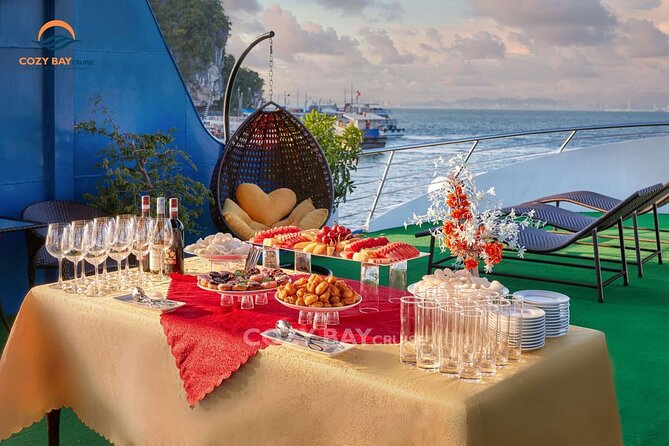 Cozy Bay Halong 5-Star Day Cruise, Buffet, Cave, Kayak, Swimming - Buffet lunch and the sunset party: snacks that actually help