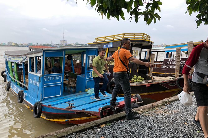 CuChi Tunnels&Mekong Delta-Boat,TukTuk,Coconut Village SmallGroup - My Tho village touches: tuk tuk or electric car, plus fruit-fueled breaks