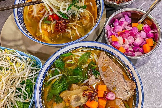 Da Nang Street Food Private Tour With Local Students - Dragon Bridge stop: a built-in pause for rest and photos