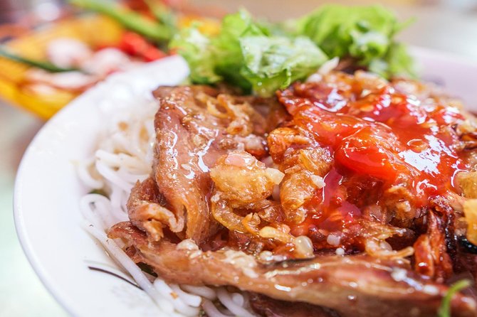 DaNang Night Foodie Tour-Sighseeing with Aodai Lady Rider Private - Quick hits before you go
