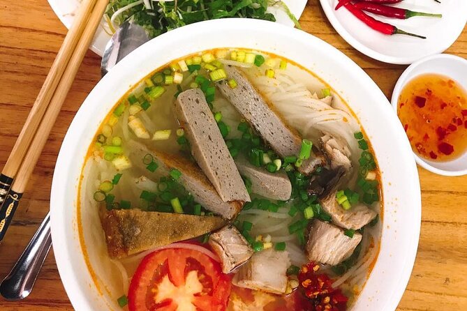 DaNang Night Foodie Tour-Sighseeing with Aodai Lady Rider Private - Rain, comfort, and what to bring for a smooth night