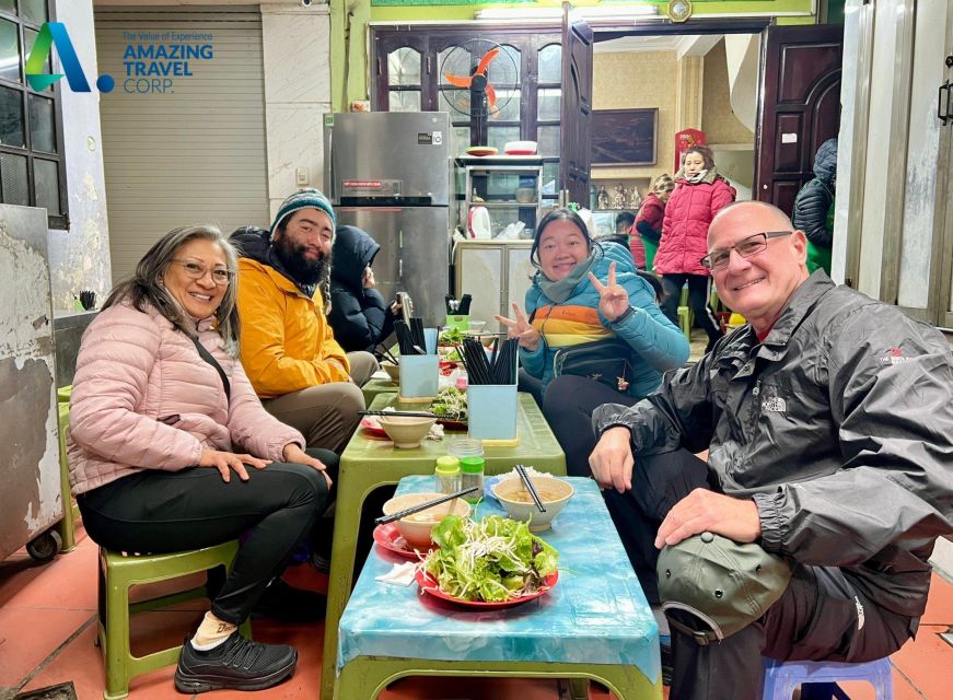 Discover Hanoi's Street Food by Night & Mini Class Coffee - The cultural thread: market life, heritage houses, and the old city gate
