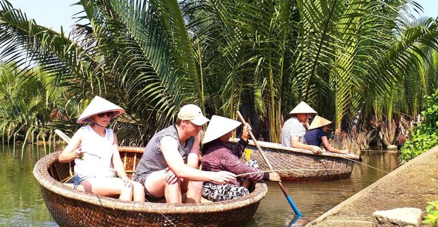 Experience Bamboo Basket Boat on Coconut village w Locals - The conical hat moment and why it’s more than a photo trick