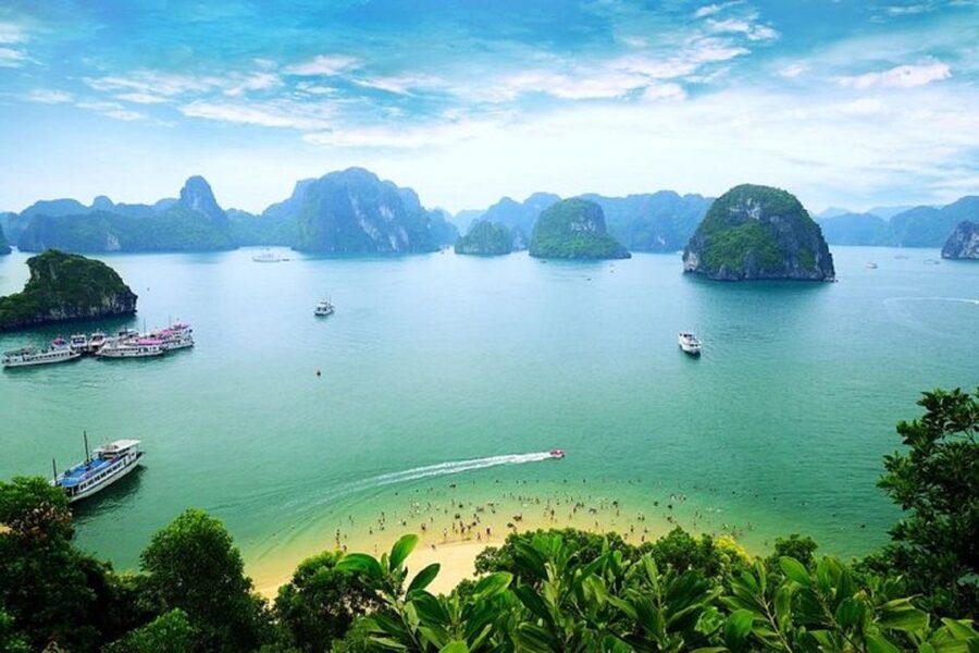 From Hanoi: 2-Day Ha Long Bay Tour with Ninh Binh and Cruise - Entering Ha Long Bay by ferry, caves, and kayak water time