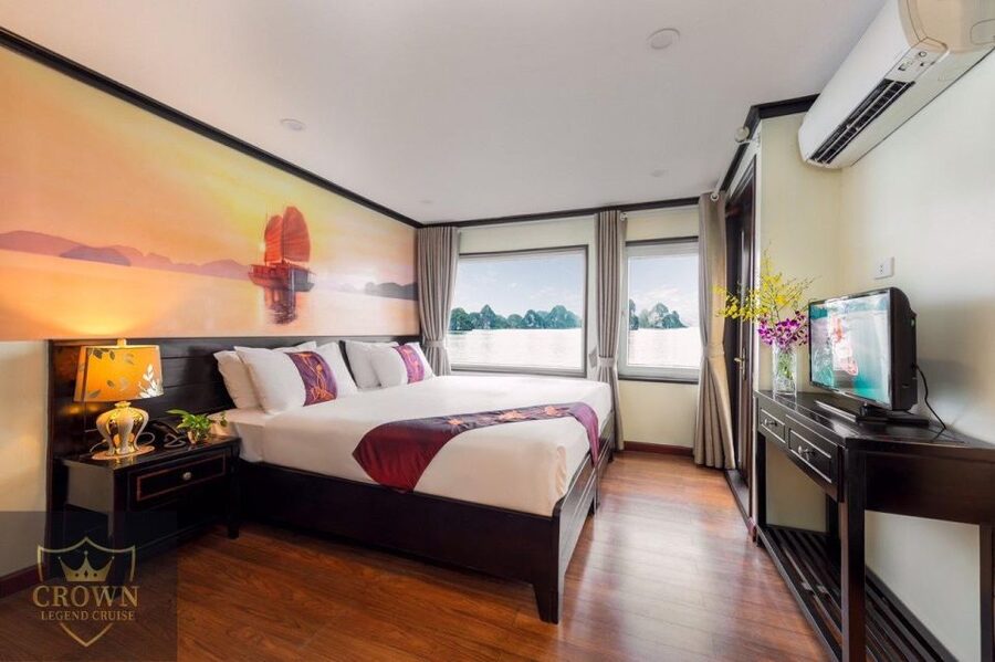 From Hanoi: 2-Day Halong Bay Cruise with Meals and Kayaking - Check-In on Crown Legend Cruise: Cabins, Safety, and First Views