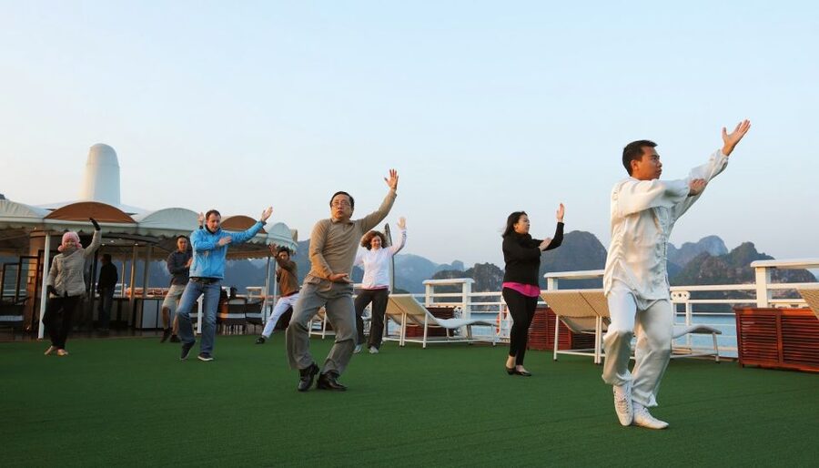 From Hanoi: 2-Day Halong Bay Cruise with Meals and Kayaking - Titop Island, Sunset Party, and Happy Hour on Deck
