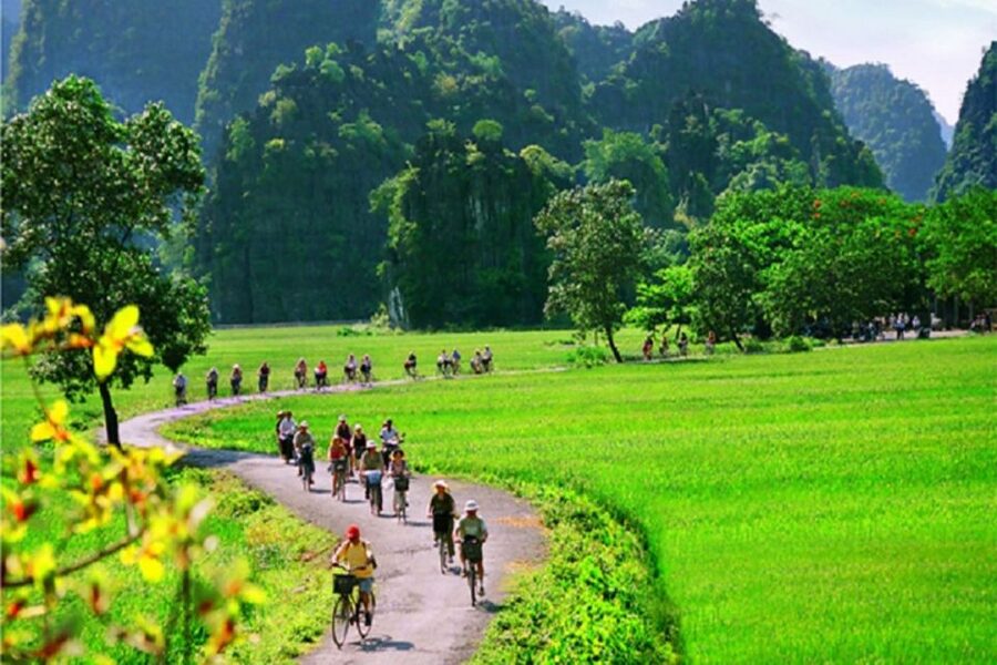 From Hanoi: 2-Day Ninh Binh Tour with Ha Long Bay Cruise - The Sunset Party on the Boat: Wine, Music, and Easy Celebration