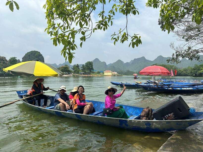 From Hanoi: Full-Day Perfume Pagoda Group Tour with Lunch - Getting Out of Hanoi: Pickup, Coach Ride, and the First Transfer