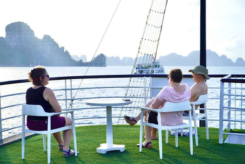 From Hanoi: Ha Long Bay Save-Cost Tours - Big & Small Groups - Sunset party and deck time on the return to Tuan Chau