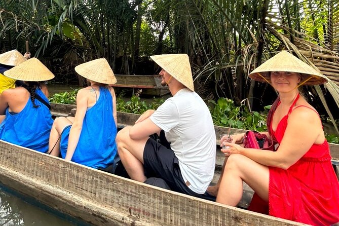 From HCM City: Mekong Delta Tour with Sampan Journey - Unicorn Islet: fruit, honey tea, folk music, and village walking