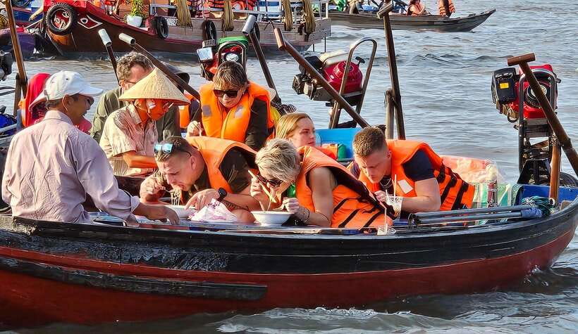 From HCM: Mekong Delta Can Tho Floating Market 2-Day Tour - Mekong River Boat Day: Fish Cages to Hand-Rowed Coconut Canals