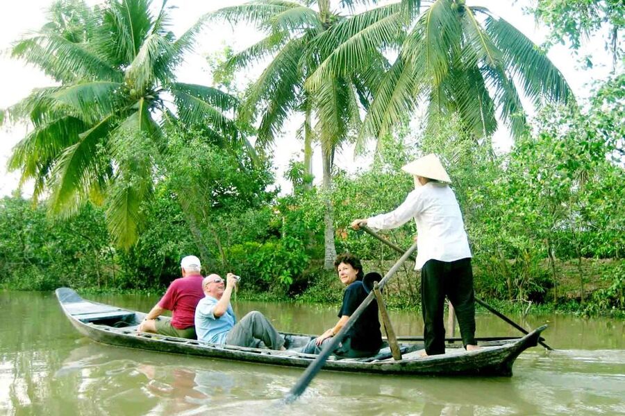 From Ho Chi Minh City: Mekong Delta VIP Tour by Limousine - Sampan canal time on Coconut Island’s little waterways