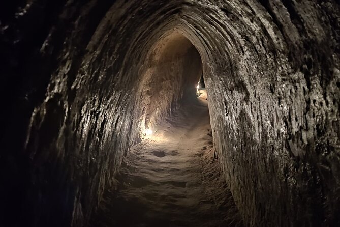 From Ho Chi Minh: Cu Chi Tunnels Half-Day History Tour with Guide - Hoang Cam smoke-less stove, plus the included tapioca and tea