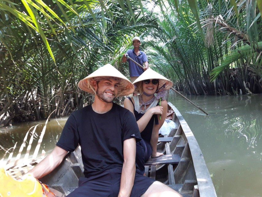 From Ho Chi Minh: Explore Mekong Delta & Vinh Trang Pagoda - The Mekong boat ride: fisherman ports, alluvial water, and sea-returning boats