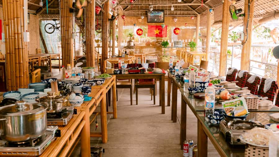 From Hoi An: Market Tour, Basket Boat Ride and Cooking Class - Bamboo basket boat through coconut palms, with a hands-on feel