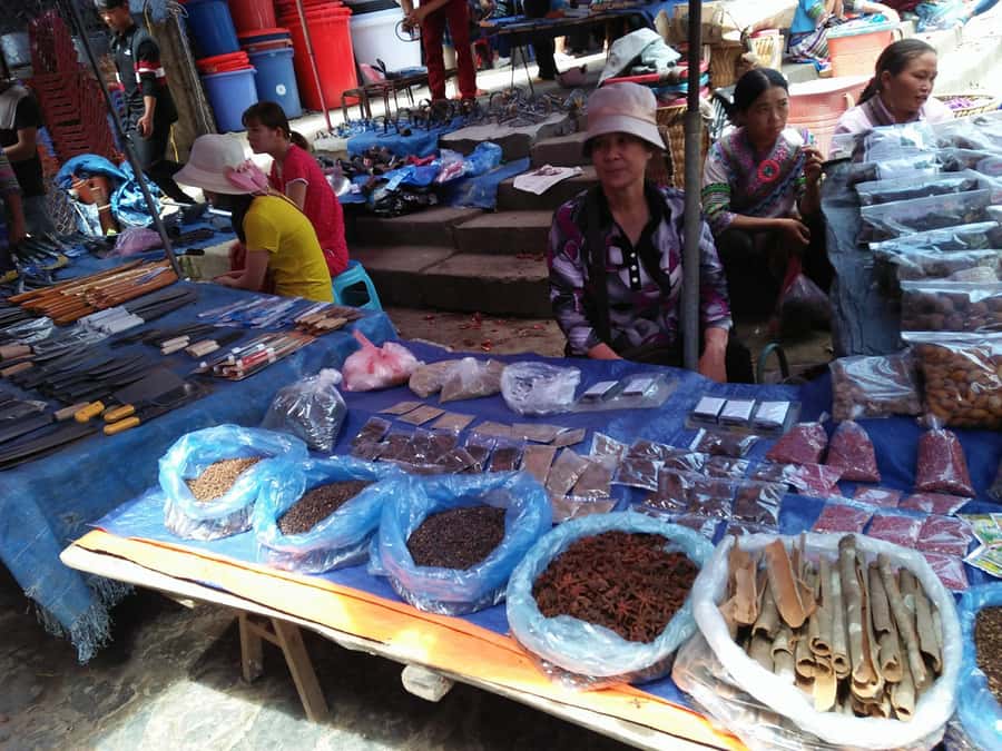 From Sa Pa: Sunday Bac Ha Market Group Tour - Shopping textiles and produce without turning it into a scramble