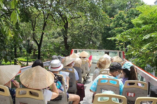 Full-Day Hop On Hop Off Bus Tour in Hanoi - Finding the stops and riding with English audio