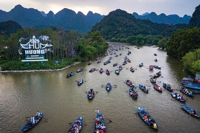 Full Day Tour to Perfume Pagoda with Traditional Boat Ride - Leaving Hanoi for Perfume Pagoda: The 60 km Countryside Start