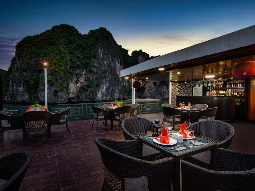 Ha Long Bay: 2-Day Tour with La Pandora Boutique Cruise - Day 2: Sunrise, Dark and Bright Cave, and local rowing boats