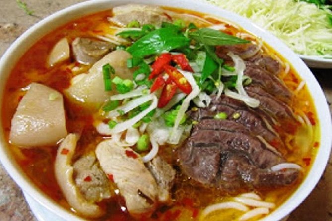Half-Day Guided Street Food Walking Tour at Hue - Stop 3 at 2 Trương Định: Chè Huế sweetness that makes sense