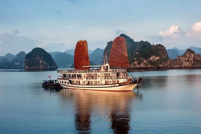 Halong Bay 2 Days 1 Night Cruise - Day 1 on the water: lunch, Titop Island, and the onboard evening rhythm