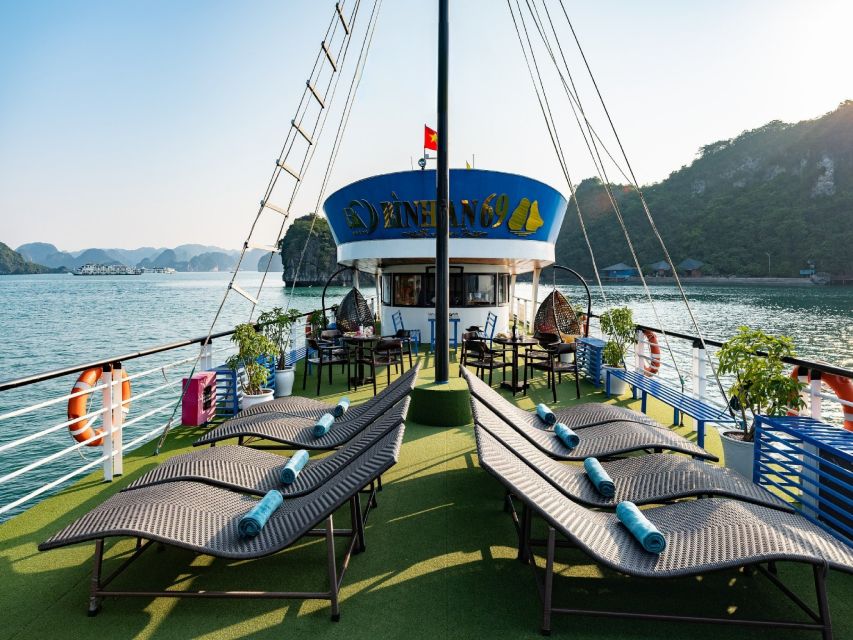 Halong Bay: Day Cruise with Caves, Kayaking & Sunset Party - Luon Cave Lagoon: Kayak or Bamboo Boat Through Quiet Water