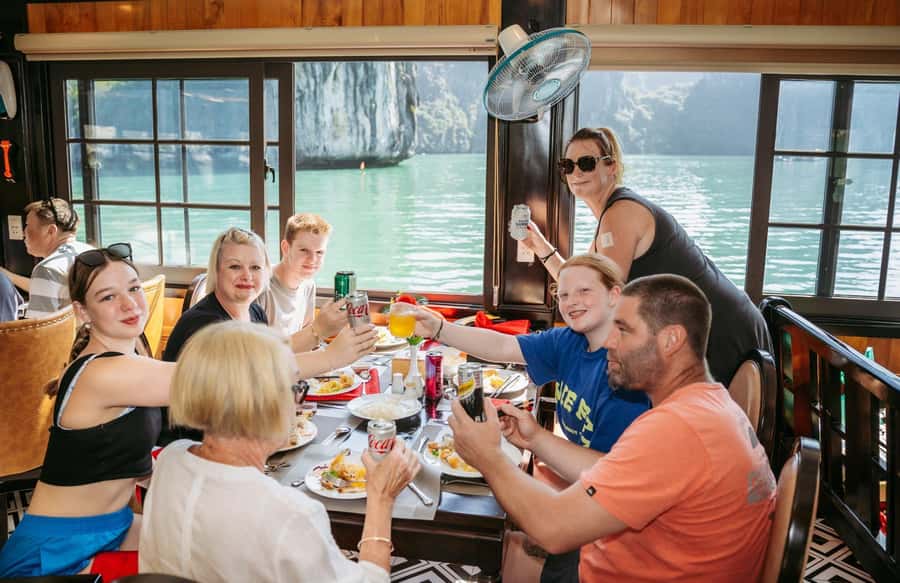 Halong Bay: Day Cruise with Caves, Kayaking & Sunset Party - Price and What It Really Costs: Base Fare Plus Fees