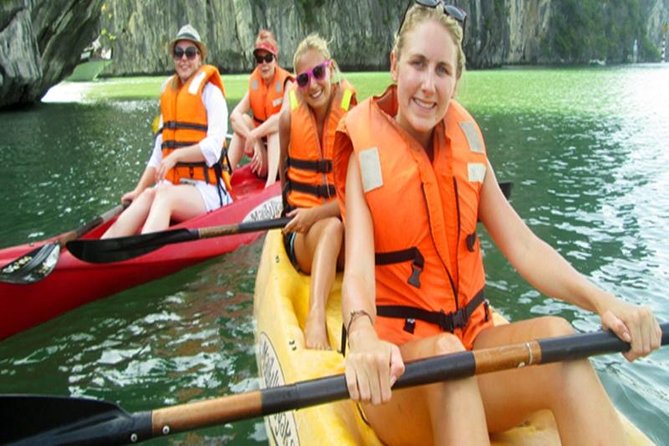 Halong Bay Day Tour: Visit Cave Island Kayaking Swimming Lunch - Arriving at Tuan Chau: lunch on the water and those famous rock names