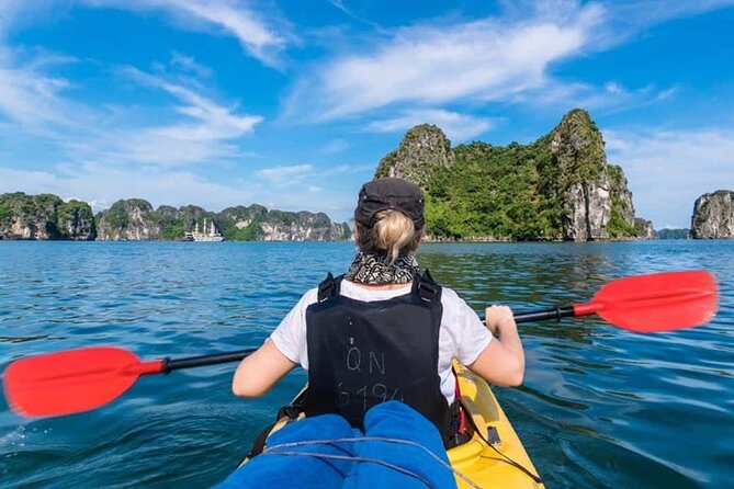 Halong Bay Day Tour: Visit Cave Island Kayaking Swimming Lunch - Hang Luon Cave: kayaking or a bamboo boat through the water-cave vibe