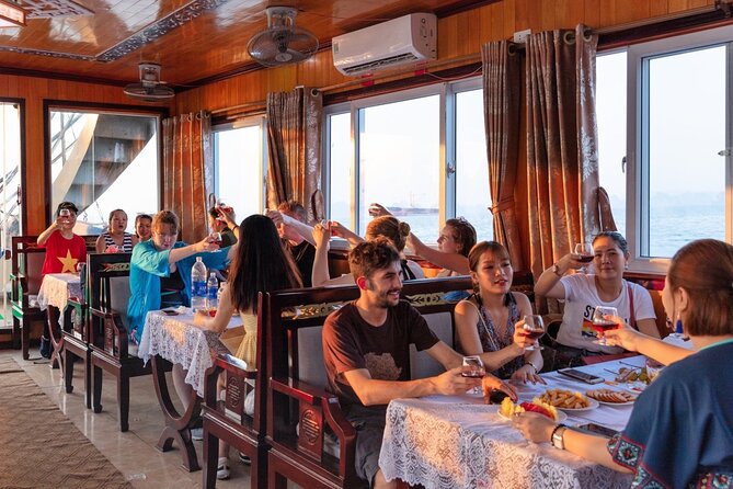 Halong Bay Day Tour With Titop Island, Cave, Kayak & Lunch - Sung Sot Cave: The Stair Workout With the Big Payoff