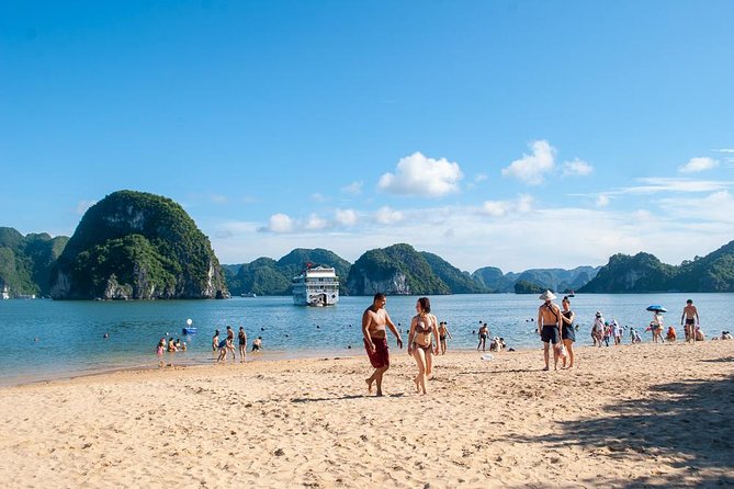 Halong Bay Day Tour With Titop Island, Cave, Kayak & Lunch - The Sunset Party on Deck Makes the Day Feel Like a Mini-Cruise