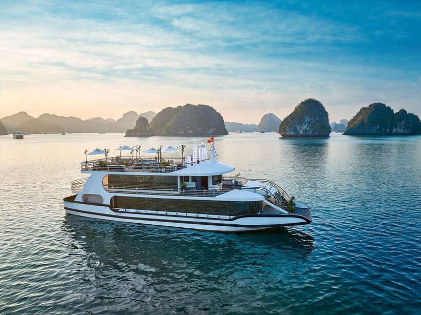 Halong Bay: Luxury Day Cruise with Buffet, Kayak, Swim - Cave stops: Surprising Cave and Sung Sot cave photo moments