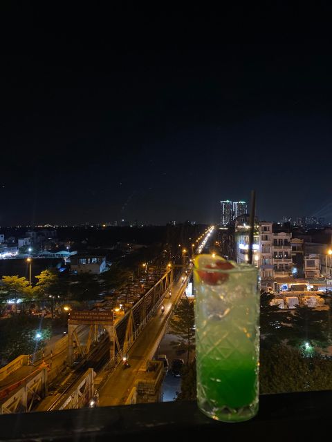 Hanoi: 7 Tastings Street Food Tour with Train Street - Train Street at night: the photo moment, but also a real neighborhood experience
