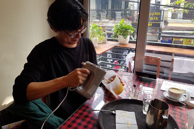 Hanoi Egg Coffee making course - The hands-on moment: making the drink and getting the top right