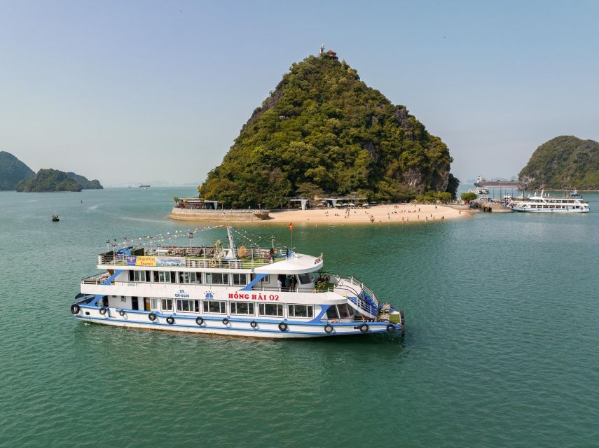 Hanoi: Halong Bay Day Trip with Titop Island, Cave, & Kayak - Titop Island Steps for Views, Beach Time for Recovery