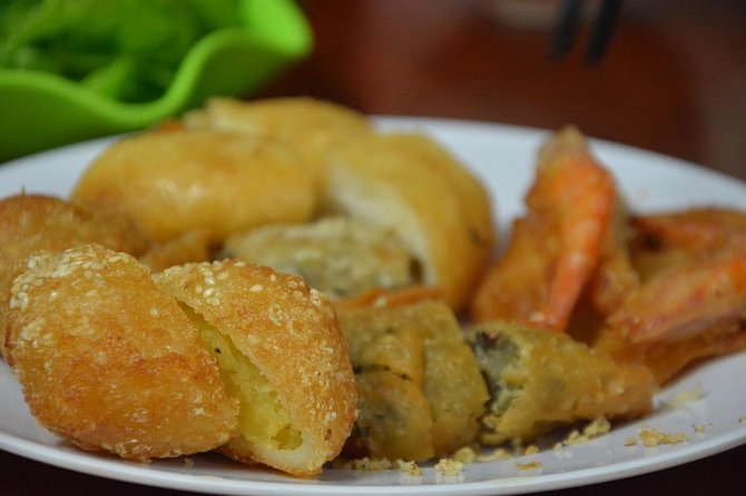 Hanoi Motorbike Tours Led By Women: Hanoi By Night Foodie Motorbike Tours - Old Quarter stop: where you get your bearings and your first tastes