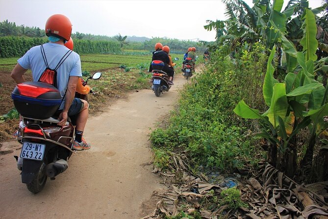 Hanoi Motorbike Tours Led By Women: Hanoi City Insight Motorbike Tours - Dường Tau and Passing Big Landmarks Like a Local