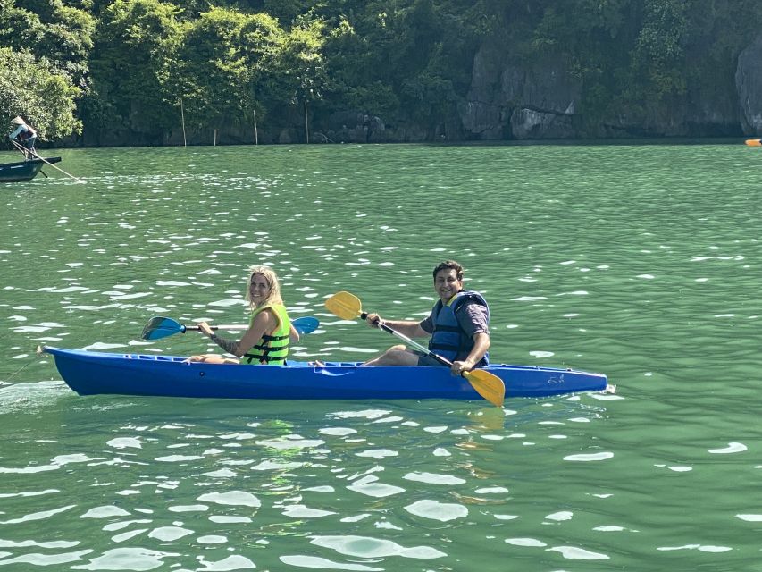 Hanoi: Roundtrip Halong Bay Islands, Caves, Kayaking & Lunch - Tuan Chau check-in, lunch, and the rocks you will spot