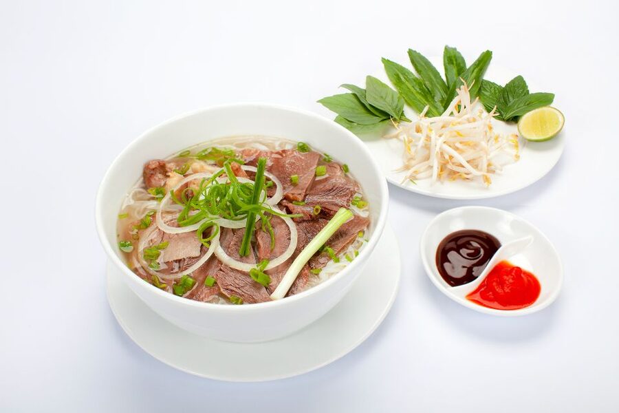 Hanoi: Small-Group Street Food Walking Tour - Pho on the street: broth, herbs, and why the guide matters